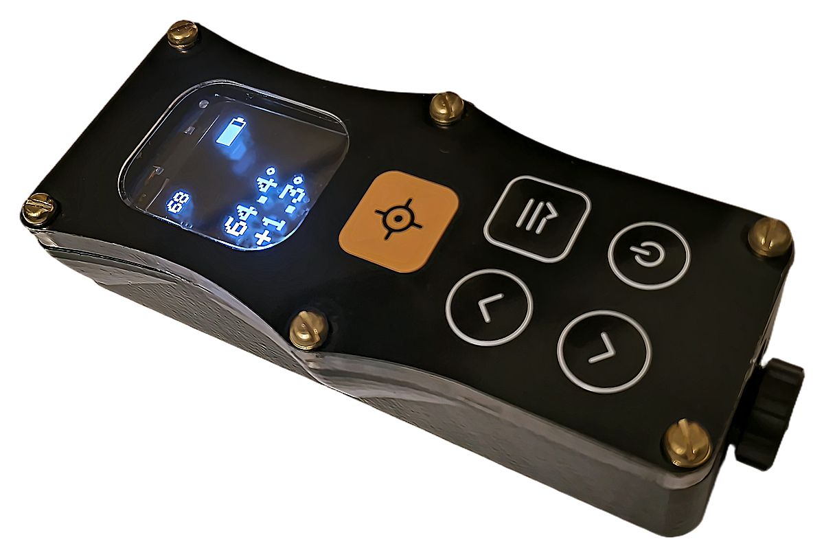 The DiscoX cave survey device seen from above at an angle: a black handheld case with brass screws at the corners, a blue OLED display showing a battery icon and survey readings, a large orange trigger key with a crosshair symbol, and four membrane keys for menu, power, left and right. A knurled knob sits on the far end.